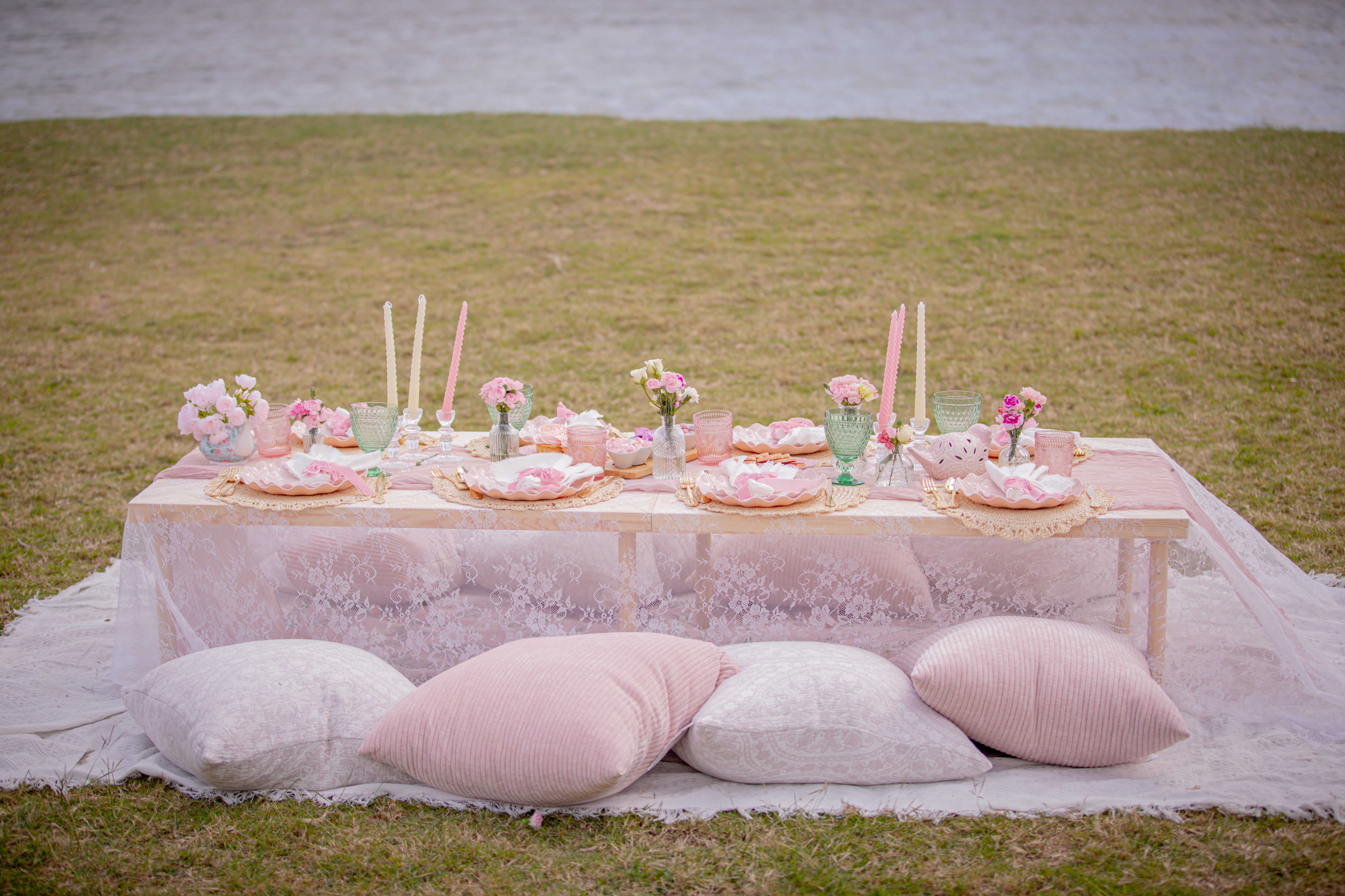 Full picnic setup with lace and cushions